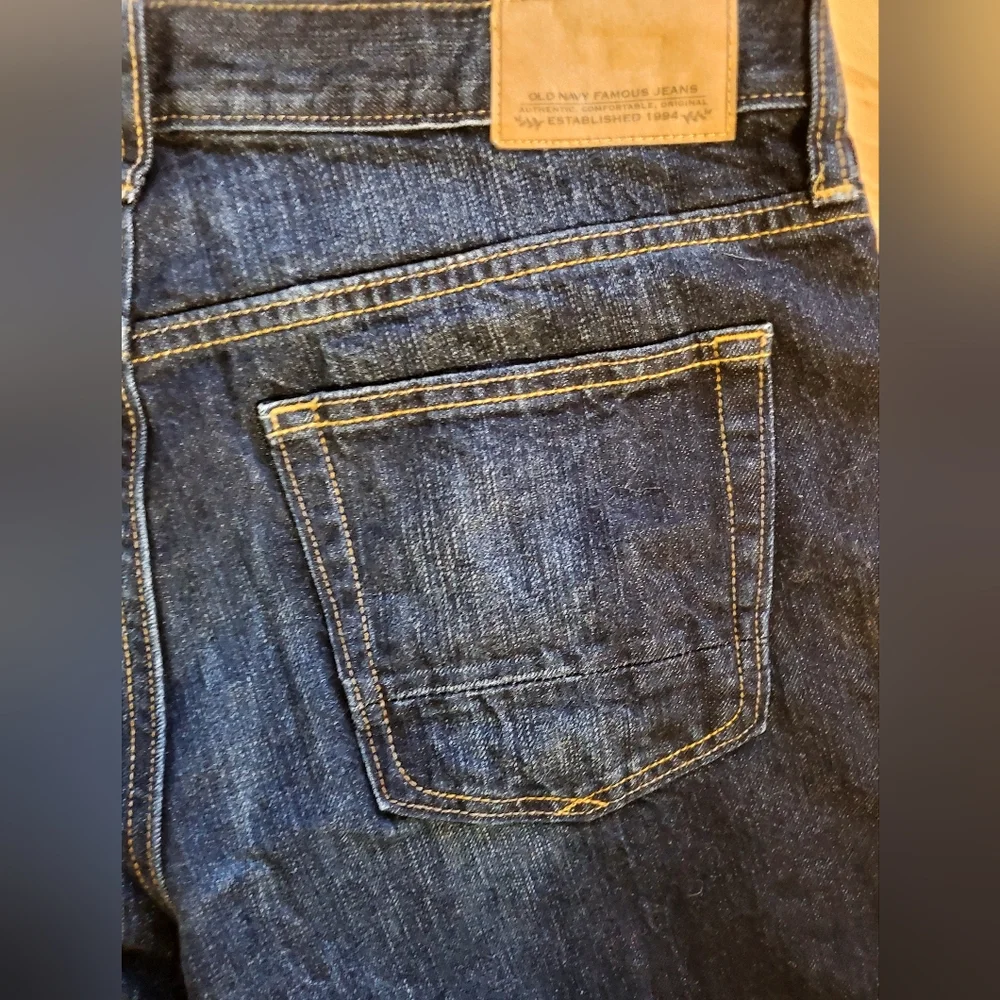 Men's Old Navy dark wash low-rise bootcut distressed denim jeans Size 33x30